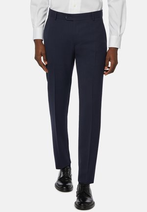 Navy dress trousers in a tailored fit, made from a smooth fabric with a slight sheen. Features a flat front and side pockets.