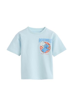 Jasnoniebieska koszulka z grafiką postaci Remy z filmu Ratatuj, noszącego kucharską czapkę, z napisem „Ratatouille Paryż, Francja.”
