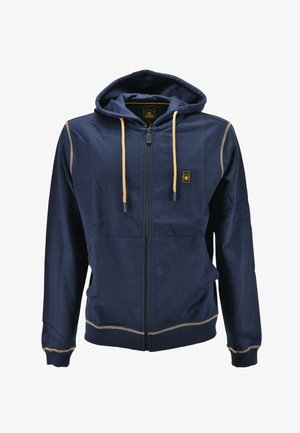 Felpa con cappuccio blu navy con zip, coulisse beige, tasche frontali, cuciture beige e una piccola toppa con logo giallo sul petto.