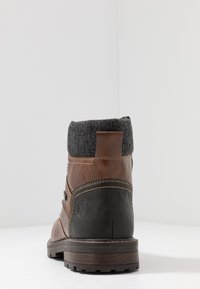 Rieker Schnürstiefelette - toffee/schwarz/granit