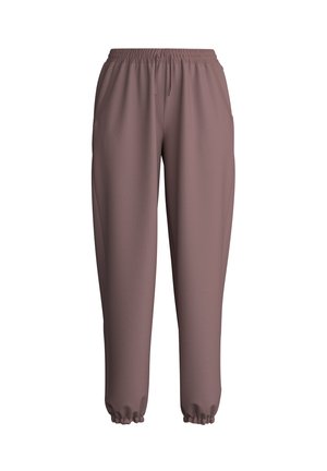 Pantalons de jogging dans une couleur mauve atténuée, avec une taille élastique, des poches latérales et des poignets élastiques aux chevilles. Texture lisse.