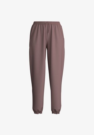 Sweatpants in einem gedämpften Mauve-Ton, mit elastischem Bund, Seitentaschen und elastischen Bündchen an den Knöcheln. Glatte Textur.