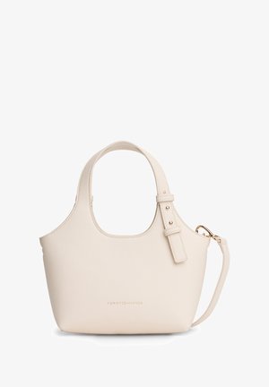 Lichtbeige handtas van gestructureerd kunstleer. Voorzien van een gladde, afgeronde vorm, een kort handvat, een verstelbare band en gouden metalen accenten.