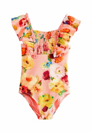 Bañador rosa con flores para bebé, con tirantes con volantes y panel fruncido en el pecho, con estampados de flores amarillas, rojas y verdes.