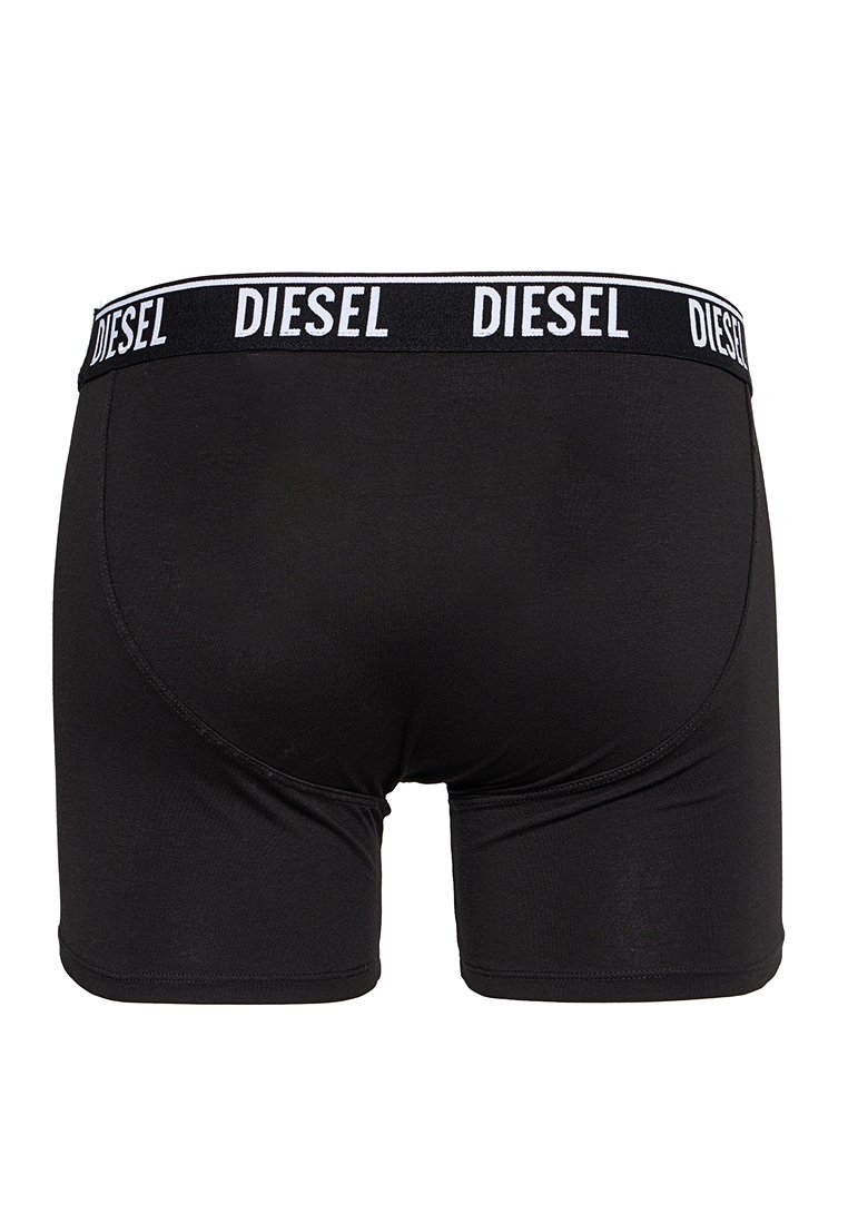 Boxer briefs neri in cotone con una fascia elastica bianca che presenta il logo "DIESEL" ripetuto. Design snello con una texture liscia.