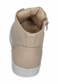 Beige leather ankle boot with a soft inner lining and side zipper. Features a white rubber sole and minimal stitching details.