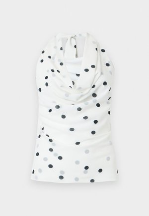 Haut dos-nu blanc à pois noirs et gris, avec un col bénitier et une fermeture à nouer dans le dos.