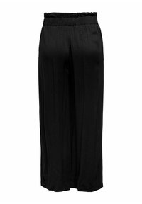 Zwarte wijde broek met elastische tailleband, met een gladde textuur en een vloeiende silhouet, ontworpen voor comfort en bewegingsvrijheid.