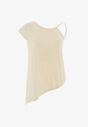 Haut asymétrique en crème avec des manches courtes, fabriqué en tissu doux ; présente une seule bretelle et un drapé fluide.