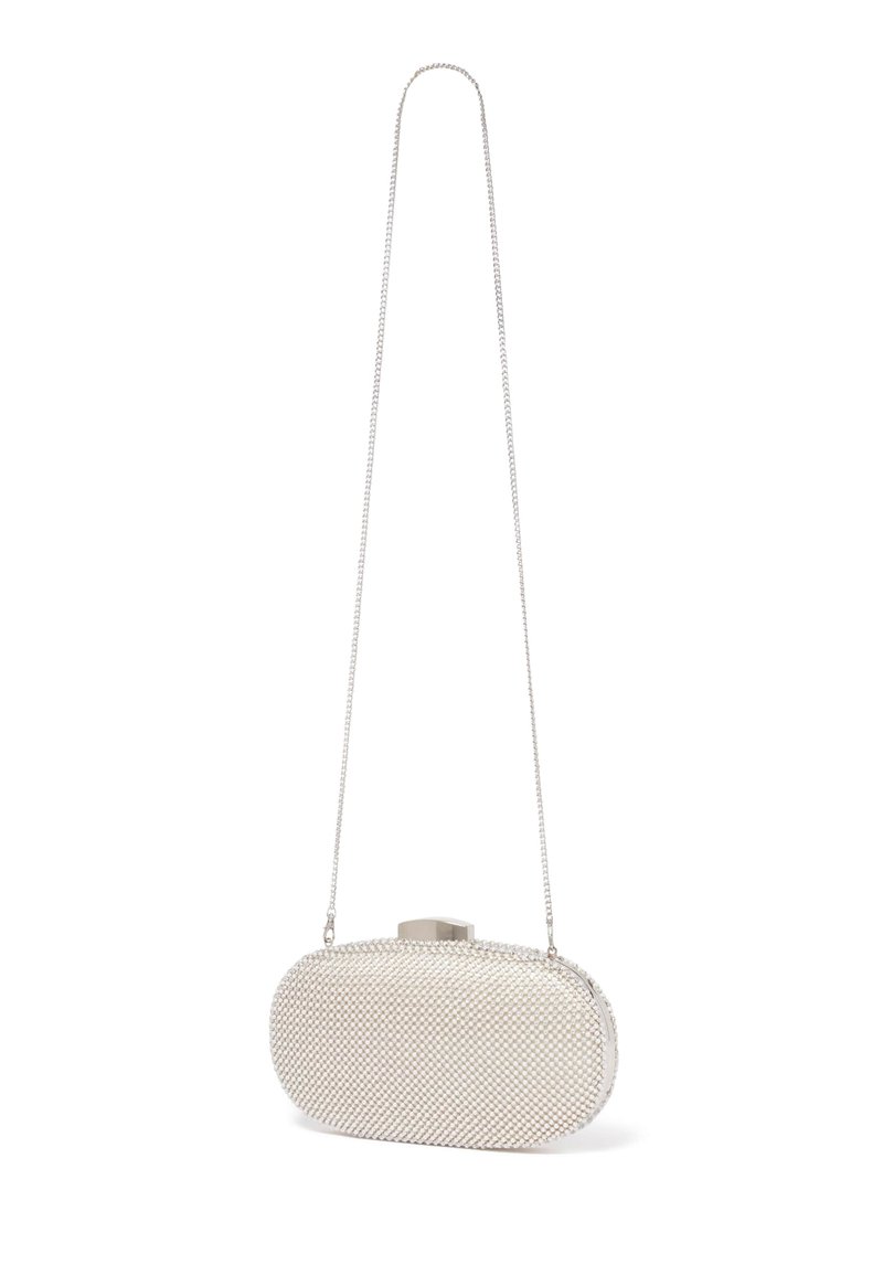 Metaliczna srebrna kopertówka o owalnym kształcie, teksturowanej powierzchni z koralików i srebrnym łańcuszkiem. Posiada zapięcie na górze.