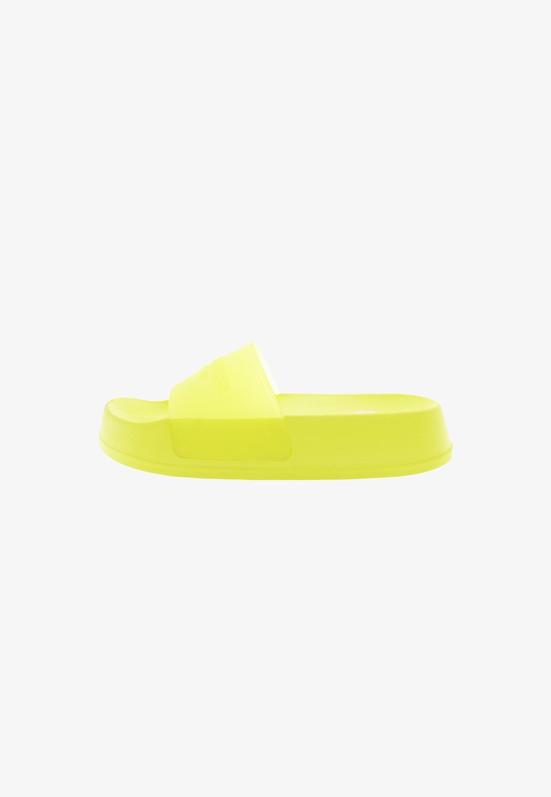 Yellow slide sandal made of flexible plastic, featuring a wide strap across the upper, flat sole, and a smooth, slightly textured surface.