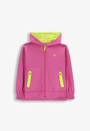 Różowa kurtka z kapturem na zamek błyskawiczny z jaskrawymi żółtymi akcentami na zamku, kaptur podszyty siateczką, dwie przednie kieszenie i elastyczne mankiety.