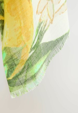 Linen scarf featuring a floral pattern in yellow and green, with fringed edges. The texture is lightweight and slightly translucent.
