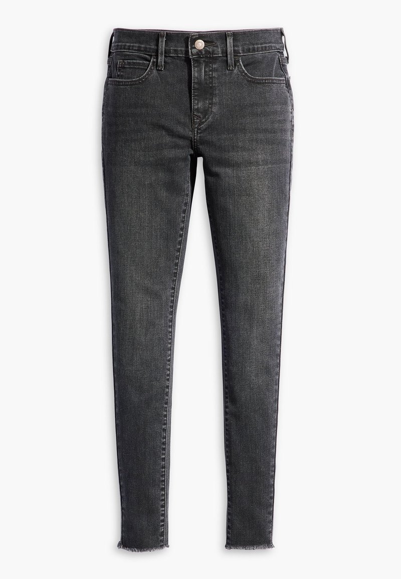 Jean denim noir slim-fit avec cinq poches, fermeture par boutons et ourlet brut aux chevilles, présenté sur fond blanc.
