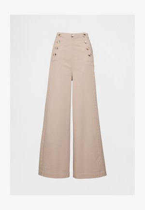 Beiga vida byxor med hög midja, utrustade med stora knappar på framfickorna och ett mjukt, lätt tyg.