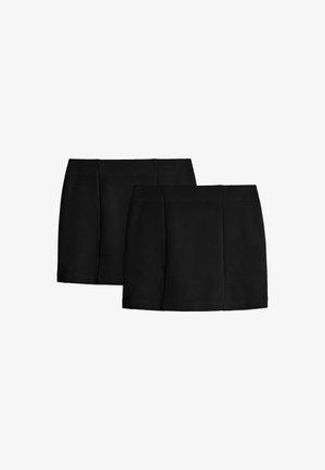 Deux jupes crayon noires, de longueur genou et à design simple, exposées côte à côte sur un fond blanc.