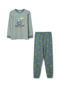 Langermige groene pyjama-top met een Minecraft-illustratie, gecombineerd met groene broek met een herhaaldelijk patroon van creeper gezichten.