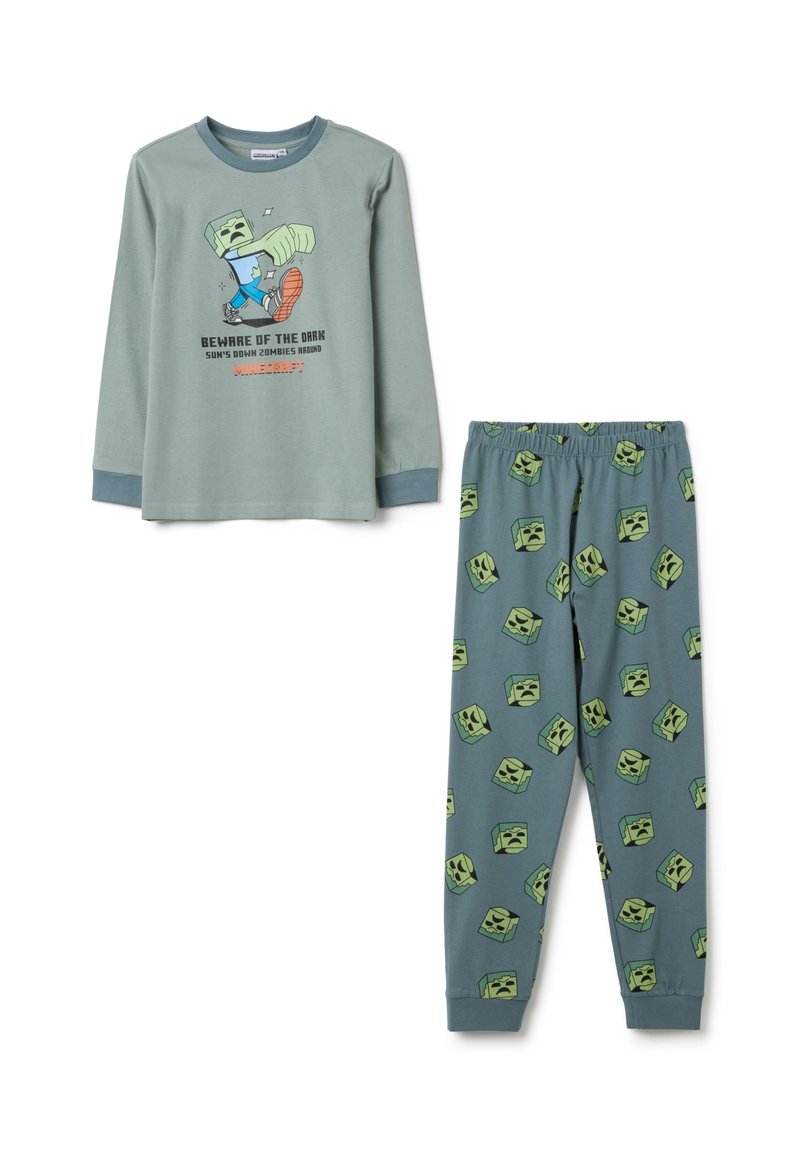 Langermige groene pyjama-top met een Minecraft-illustratie, gecombineerd met groene broek met een herhaaldelijk patroon van creeper gezichten.