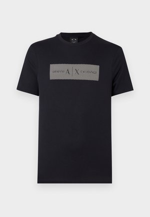 Black short-sleeve crewneck t-shirt with a white rectangular graphic featuring diagonal lines and "A|X" logo centered on chest.