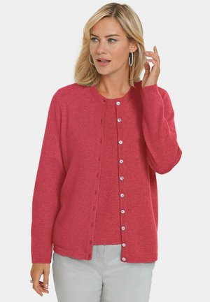 Cardigan gemaakt van zachte, gestructureerde stof in een heldere roze kleur, met lange mouwen, ronde halslijn en bijpassende knoopsluitingen.