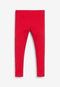 Röda leggings i mjuk bomull, med en elastisk midja och figurnära design. Inga mönster eller utsmyckningar finns.