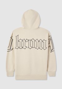 Beżowa bluza z kapturem z czarnym tekstem w stylu gotyckim częściowo piszącym "Chrome" na plecach i przechodzącym na rękawy.