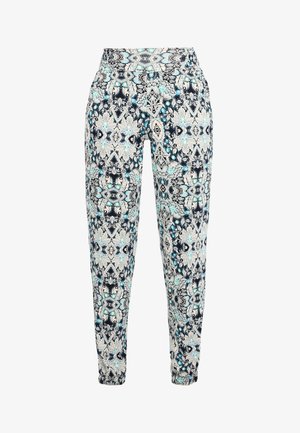 Geprinte joggerbroek met een hoge taille. Heeft een kleurrijk ontwerp in blauwtonen en neutrale kleuren. Gemaakt van zachte, rekbare stof.