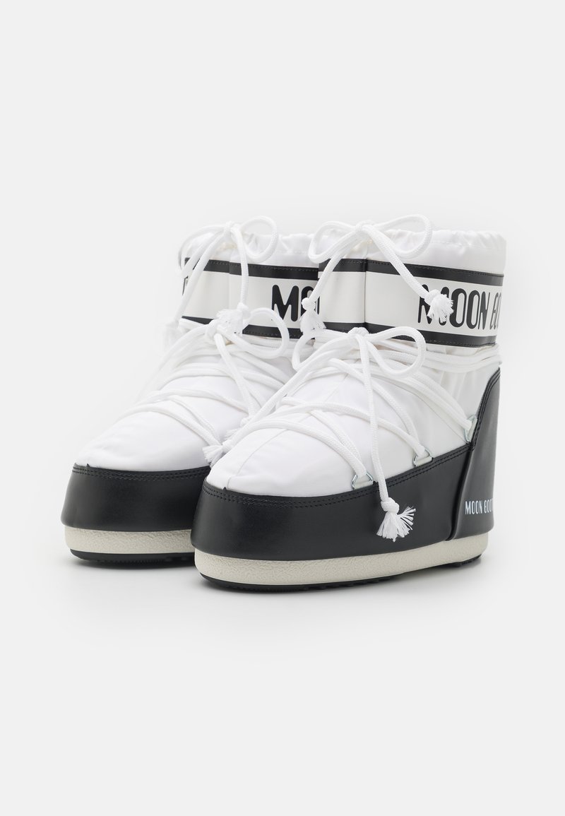 moon boots black and white