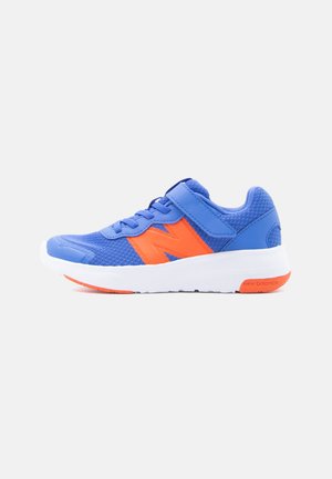 Blue and orange athletic sneaker with white sole, lace-up and Velcro strap, breathable mesh upper, side logo, isolated on light background.