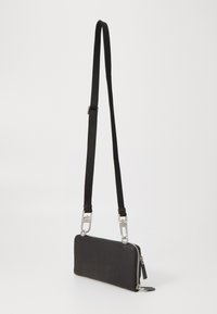 KARL LAGERFELD MONOGRAM POUCH - Rankinė per petį - black