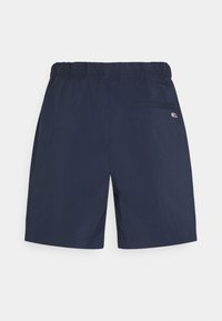 Shorts bleu marine en tissu léger avec une taille élastique, dotés d'une poche à l'arrière et d'un petit logo en accent.
