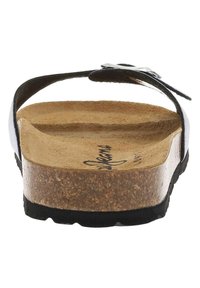 Sandale en cuir noir avec une semelle en liège, une sangle réglable et une semelle texturée pour une meilleure adhérence. La vue de dos met en avant les détails du design et des matériaux.