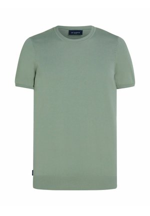 Chemise tricotée à manches courtes et col rond de couleur vert clair, avec col, poignets et ourlet côtelés, dotée d'une petite étiquette noire sur le côté.