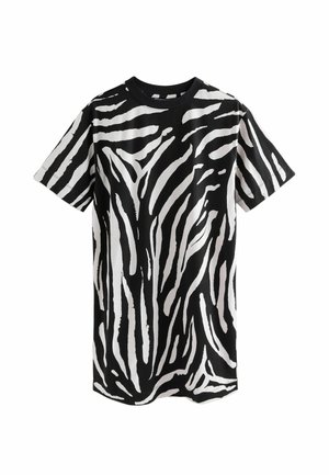 T-shirt noir et blanc à manches courtes avec un motif abstrait de rayures de zèbre couvrant tout le tissu.