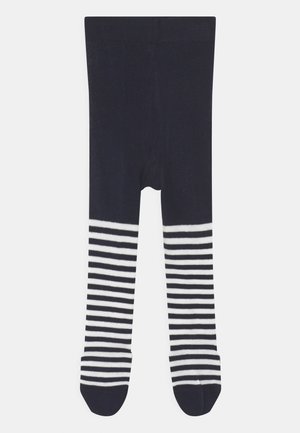 Collants marins avec une texture côtelée, présentant un motif de rayures horizontales blanches dans la partie inférieure. Design sans coutures au niveau des orteils.