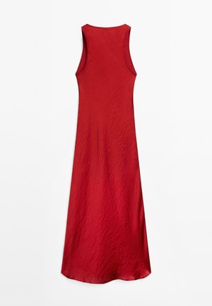 Red sleeveless dress hanging against a white background, featuring a simple design and subtle texture.