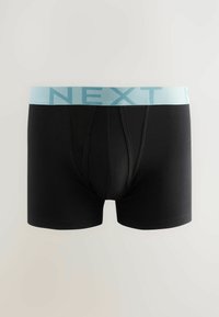Fekete boxer alsónadrág világoskék színű elasztikus derékpánttal, amelyen vastag betűkkel a "NEXT" felirat szerepel. Simaság jellemzi, combközép hosszúságú.