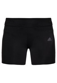 Svarta sportshorts i ett slätt, elastiskt tyg. Har en elastisk midja och en liten tonad Adidas-logga på vänster sida.