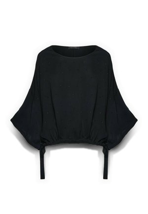 Blusa nera a vestibilità ampia con ampie maniche, texture punteggiata sottile, scollo rotondo e coulisse sul bordo.
