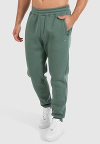 Smilodox CASUAL SPORT FIERO - Trainingsbroek - hellgrün
