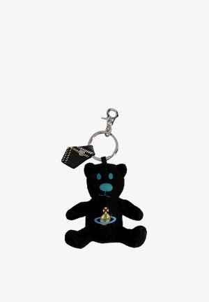 Portachiavi con orsetto di peluche nero con accenti turchesi. Presenta un ricamo di una nave sulla pancia e un gancio metallico per l'attacco.