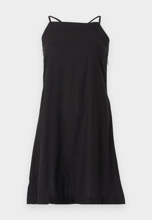 Svart, ärmlös klänning med tunna axelremmar, tillverkad av lättviktsmaterial. Har en lös A-linjeformad silhuett med en rak fåll.