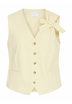 Krém színű ujjatlan mellény, öt gombbal az elülső részen és díszes masnival a jobb vállnál, két elülső hasított zsebbel.