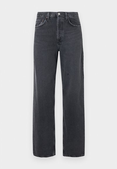 Μαύρο τζιν παντελόνι με φαρδιά μπατζάκια και ξεβαμμένο φινίρισμα, με δύο μπροστινές τσέπες και κούμπωμα με κουμπί στη μέση. Κλασικός σχεδιασμός με πέντε τσέπες.