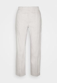 Ljusbeiga linbyxor med rak benställning, som har två sidofickor och en mjuk textur. Inga synliga knäppningar eller mönster.