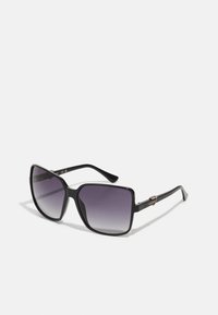 Black square sunglasses with gradient gray lenses. Features sleek plastic frame and metallic accent on temples. Minimalist design.
