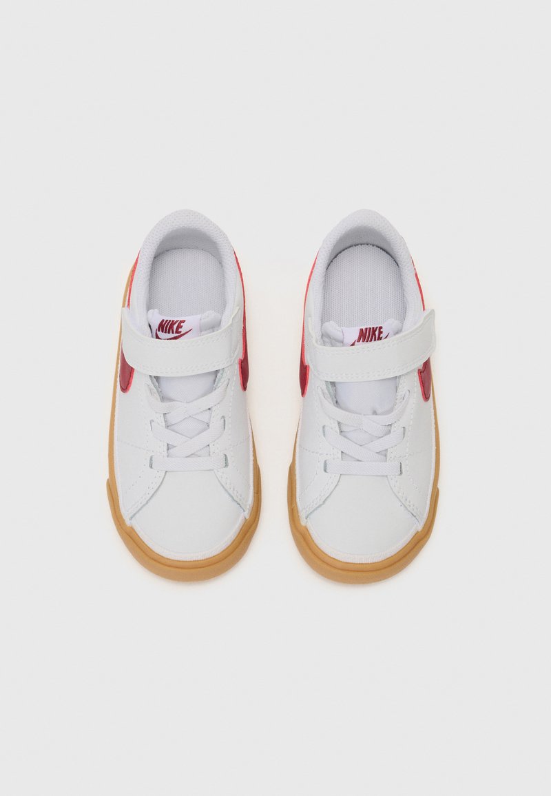 Nike White and Red Low-Top Sneakers with Velcro Strap Gym Red Accents Fire Up This Nike Air Force 1 High main image 4