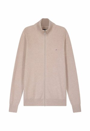 Pull en tricot beige à fermeture éclair complète avec col, poignets et ourlet côtelés, comportant un petit logo brodé sur le côté gauche de la poitrine.