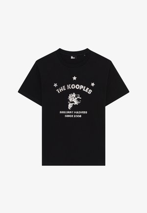 T-shirt preta de manga curta com impressão branca de três estrelas, uma motocicleta e o texto "THE KOOPLES", "BRILLIANT MADNESS SINCE 2008."