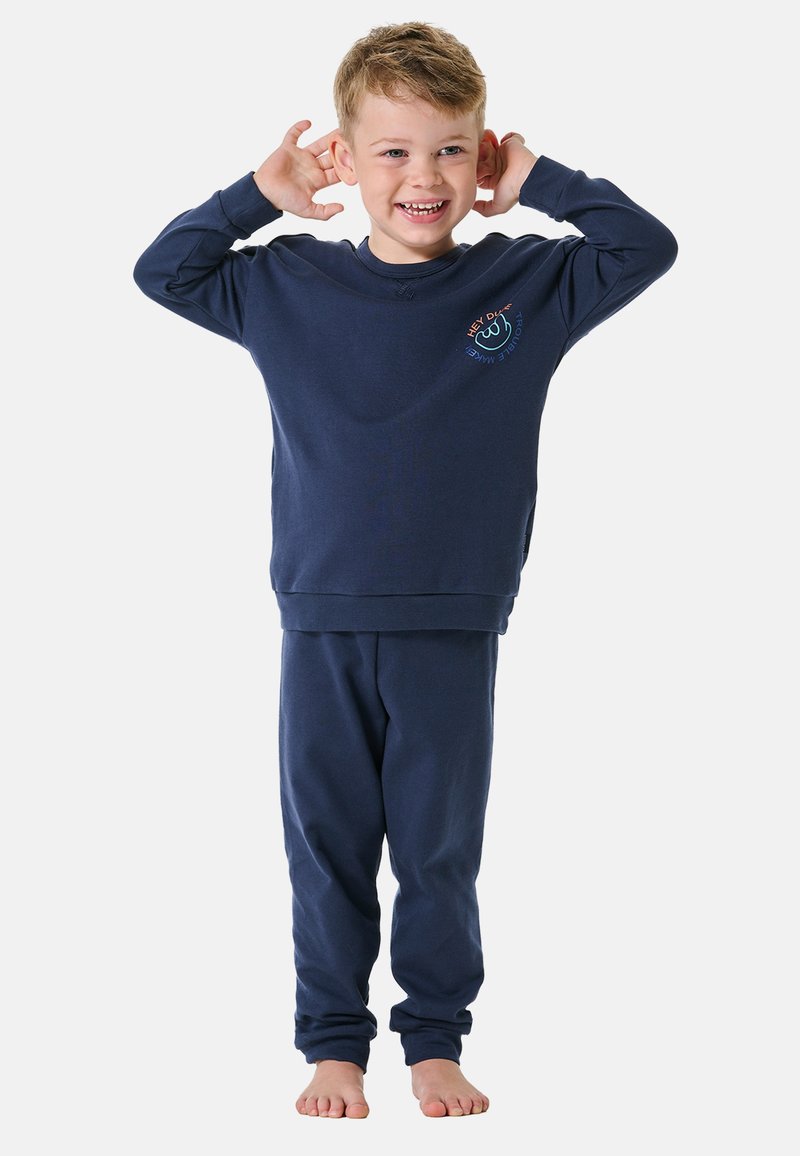Marineblaues Baumwoll-Loungewear-Set für Kinder, bestehend aus einem Langarmshirt mit Printdetail und passenden Hosen mit elastischen Bündchen.